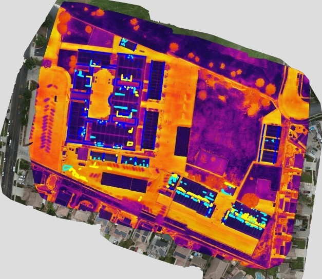 QEA Tech's digital twin of a roof with thermal overlay and polygons identifying roofing issues.